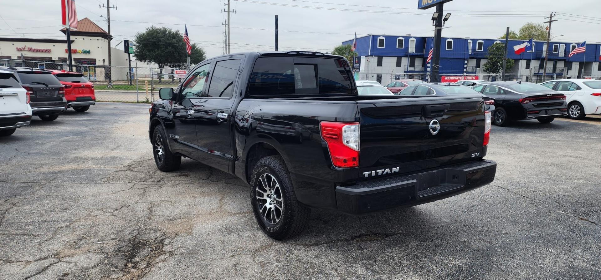 2021 Black Nissan Titan S Crew Cab 2WD (1N6AA1EEXMN) with an 5.6L V8 DOHC 32V engine, 9A transmission, located at 1842 Wirt Road, Houston, TX, 77055, (713) 973-3903, 29.805330, -95.484787 - Photo#2